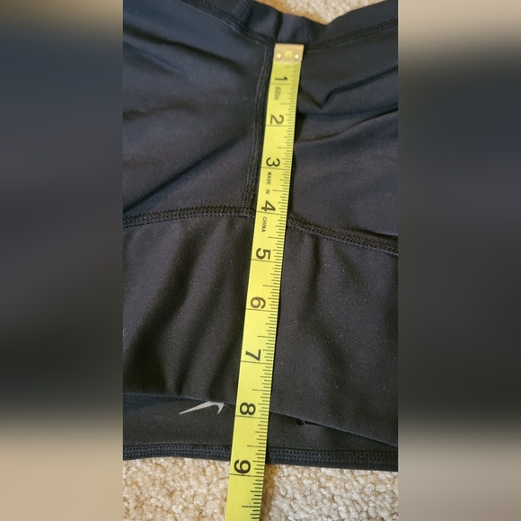 Nike dri-fit womens medium capris black with neon green & blue sheer on back of - Picture 7 of 12